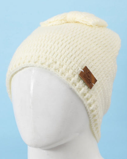 Off White Self Design Beanie Bow Handmade Knitted Woollen Cap for Girls